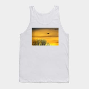 Swan flying into a golden dawn Tank Top